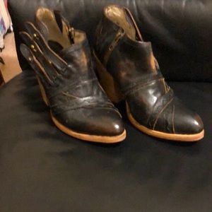 Freebirds leather booty with button clasp.